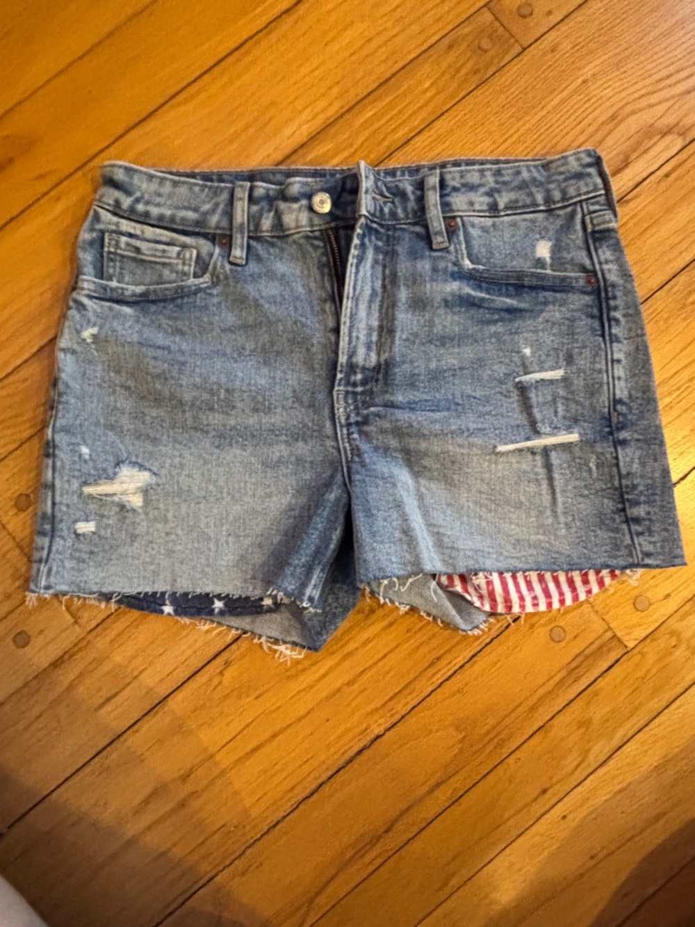 Patriotic mid rise denim cut off shorts